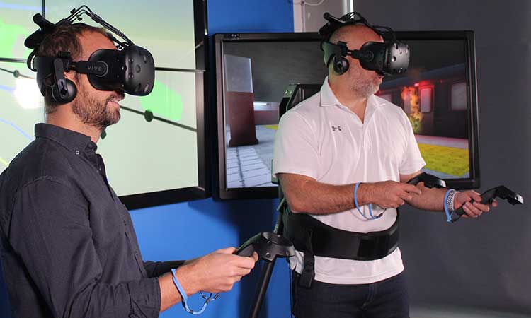 Matthieu Lauras and Frederick Benaben wearing VR headsets.