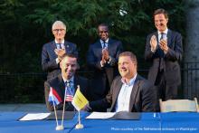 Flanked by Mr. Rutte of the Netherlands and Geert Bourgeois, minister-president of Flanders, left, Atlanta Mayor Kasim Reed looks on as Georgia Tech signs a new memorandum of understanding with European logistics institutes.